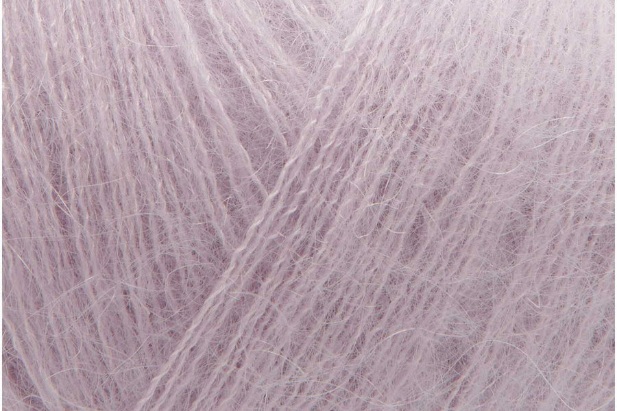 Close-up of light purple yarn texture