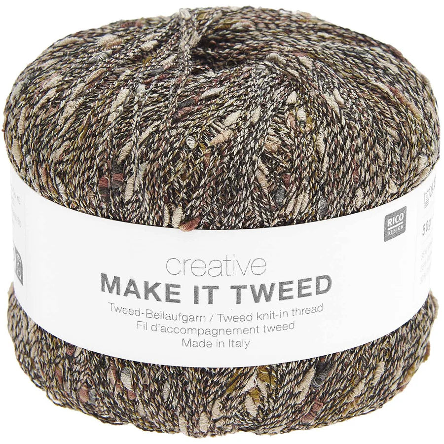 Held together tweed  yarn with a label on a white background
