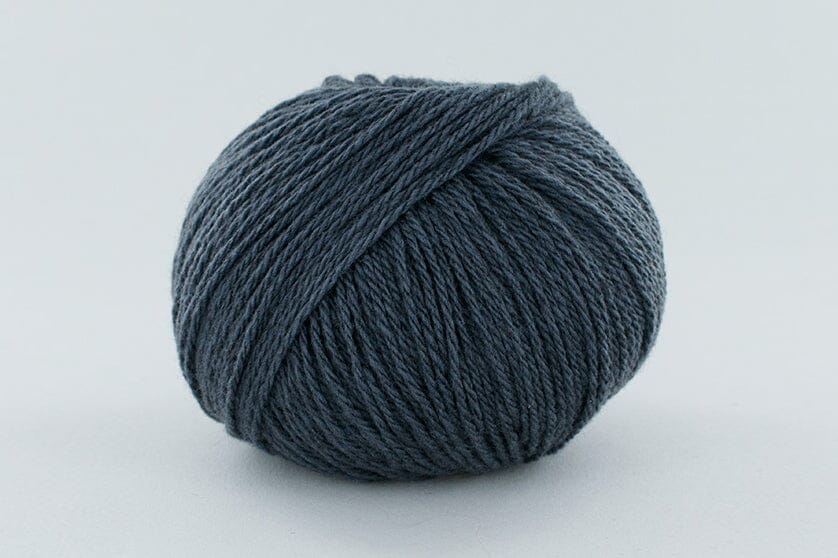 Ball of grey, blue yarn
