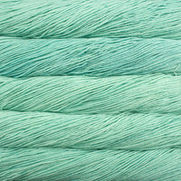 Close-up of teal yarn with a soft focus